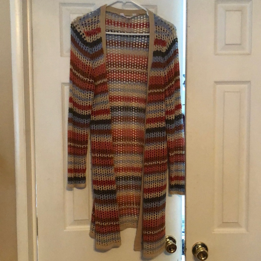 Woman’s long crocheted cardigan